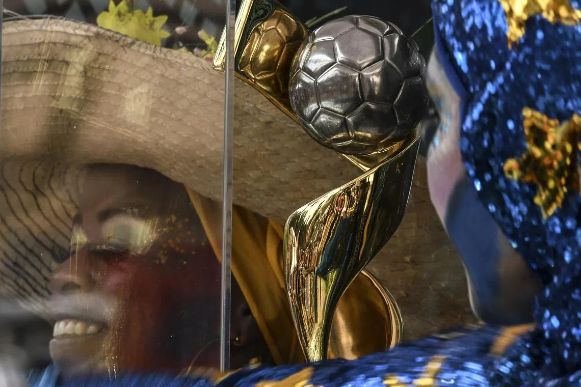 Women pose for a picture during the FIFA Women's World Cup Trophy tour in Cali, Colombia, on April 3, 2023. 