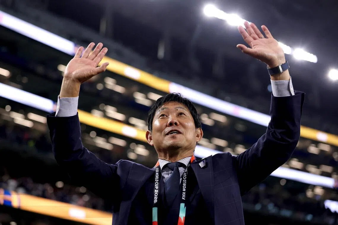 Japan coach Hajime Moriyasu acknowledging fans after the 1-1 World Cup draw against Sweden at AT&T Stadium in Texas on June 25.