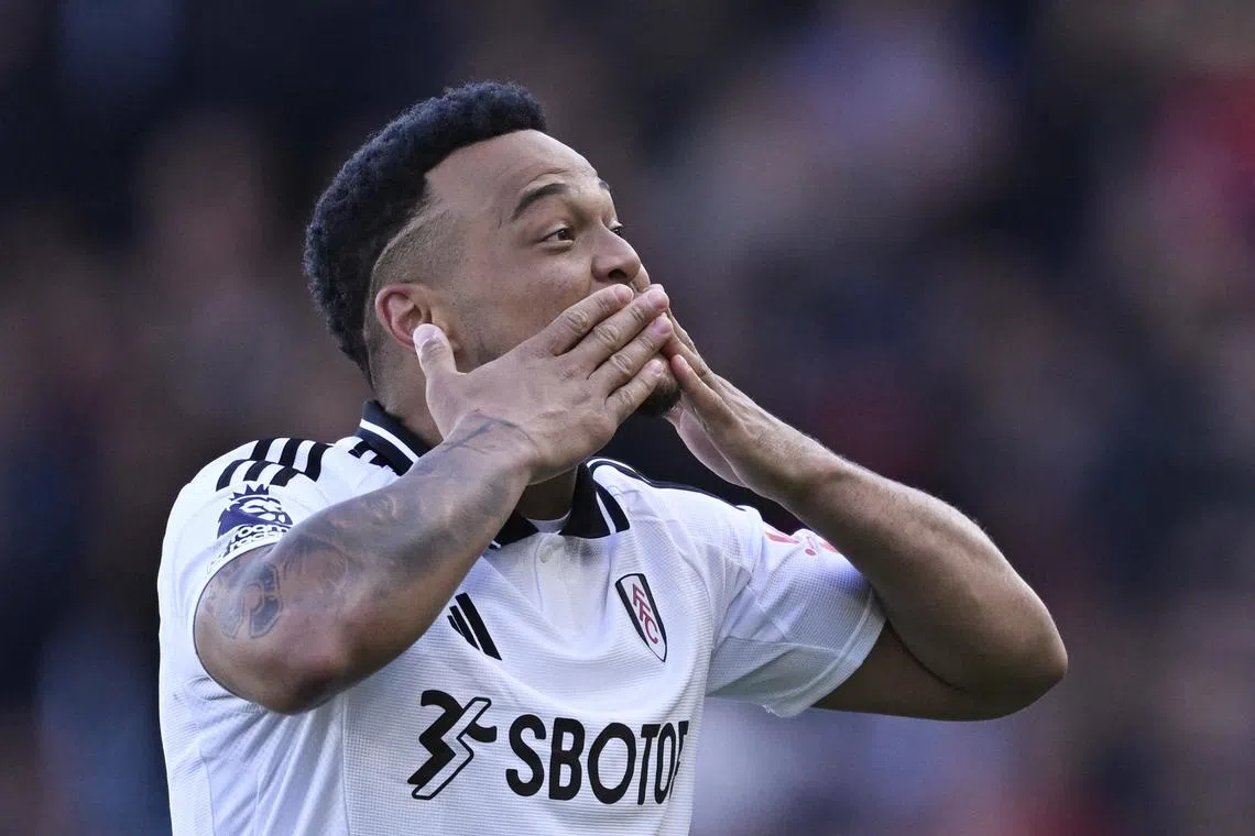 Fulham goalscorer Rodrigo Muniz celebrating after the 3-2 English Premier League win over table-toppers Liverpool at Craven Cottage on April 6.