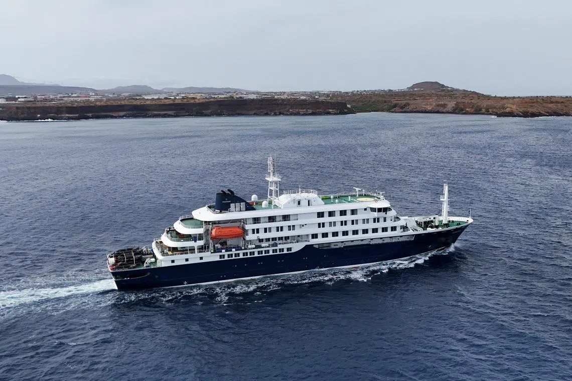 A drone view of the cruise ship MV Hondius, carrying passengers suspected of having cases of hantavirus on board, leaves Praia, Cape Verde, May 6, 2026.