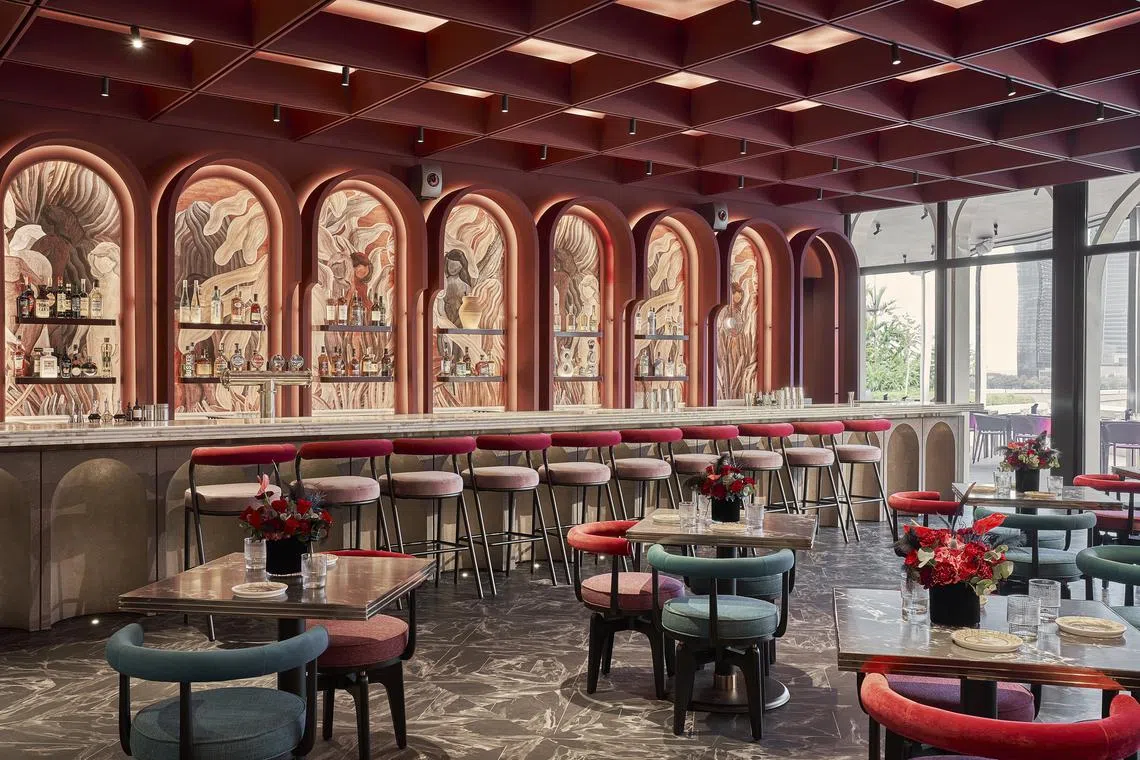 Baia's interior is decked out in rich jewel tones.