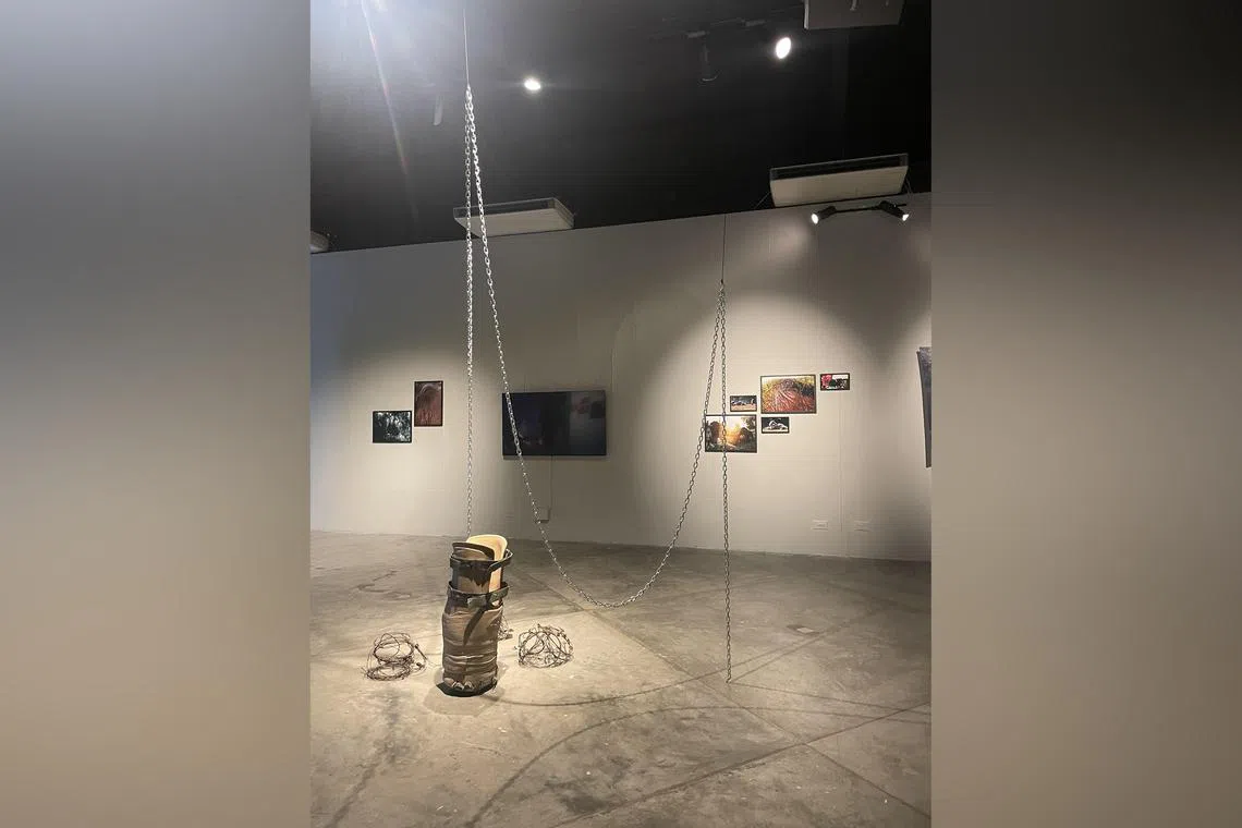 Cambodian artist and journalist Choulay Mech's work includes an elephant prosthetic leg at Objectifs.