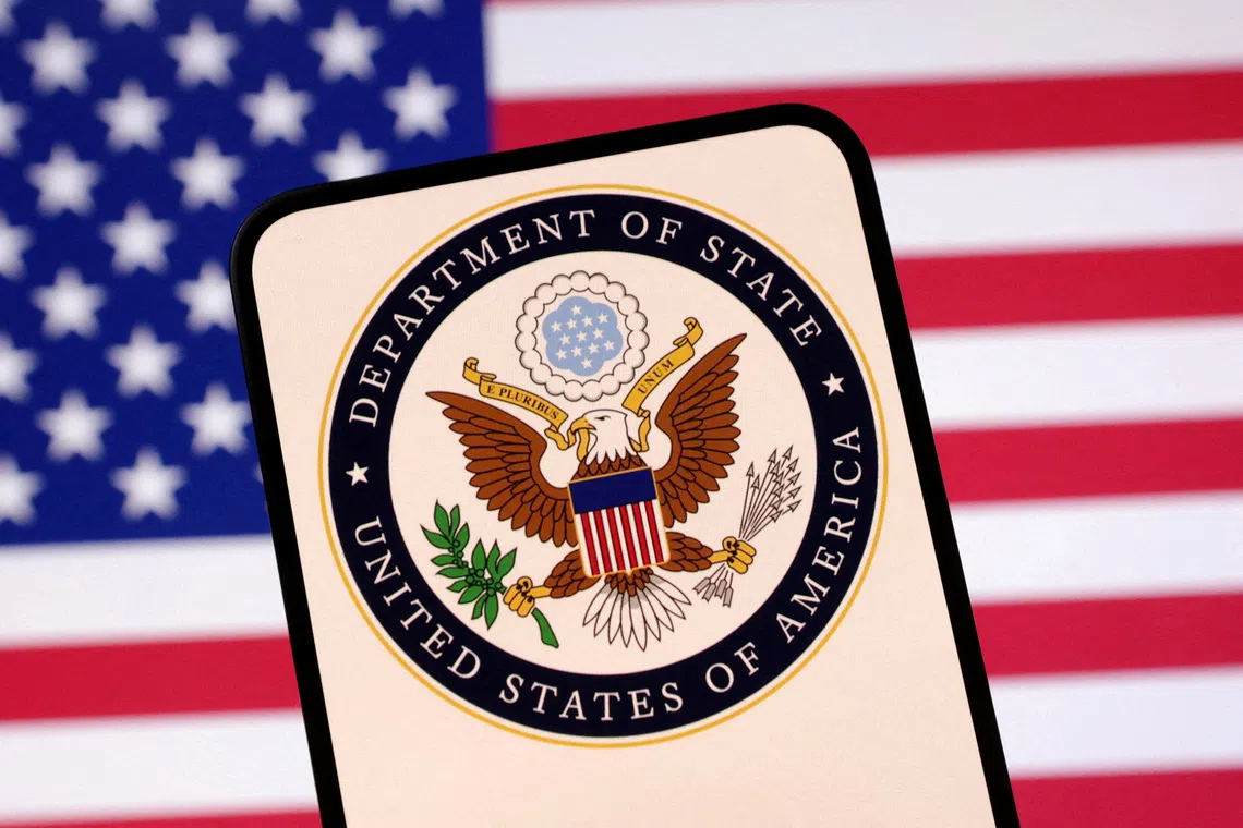 FILE PHOTO: United States Department of State logo and U.S. flag are seen in this illustration created on April 23, 2025. REUTERS/Dado Ruvic/Illustration/File Photo