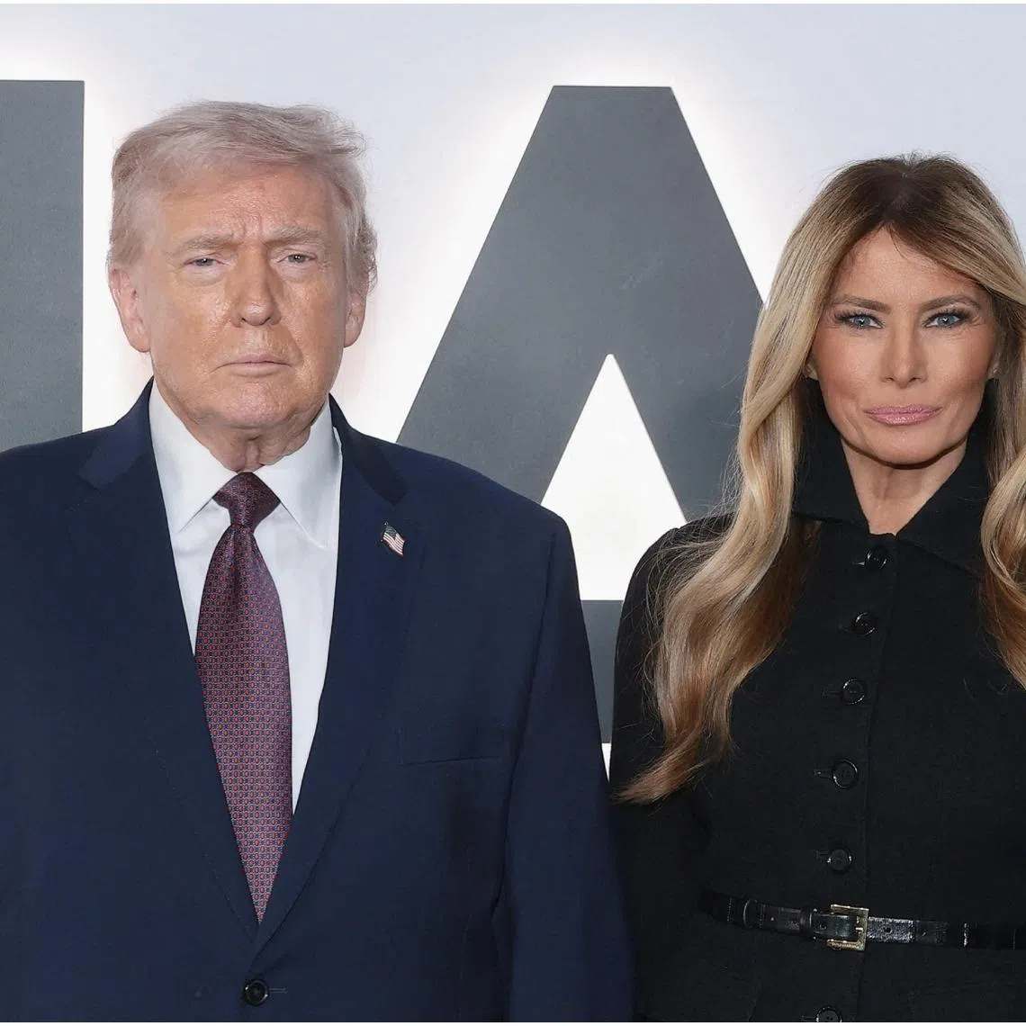 US President Donald Trump (left) and First Lady Melania Trump attend the premiere of Amazon MGM's documentary Melania in Washington on Jan 29.