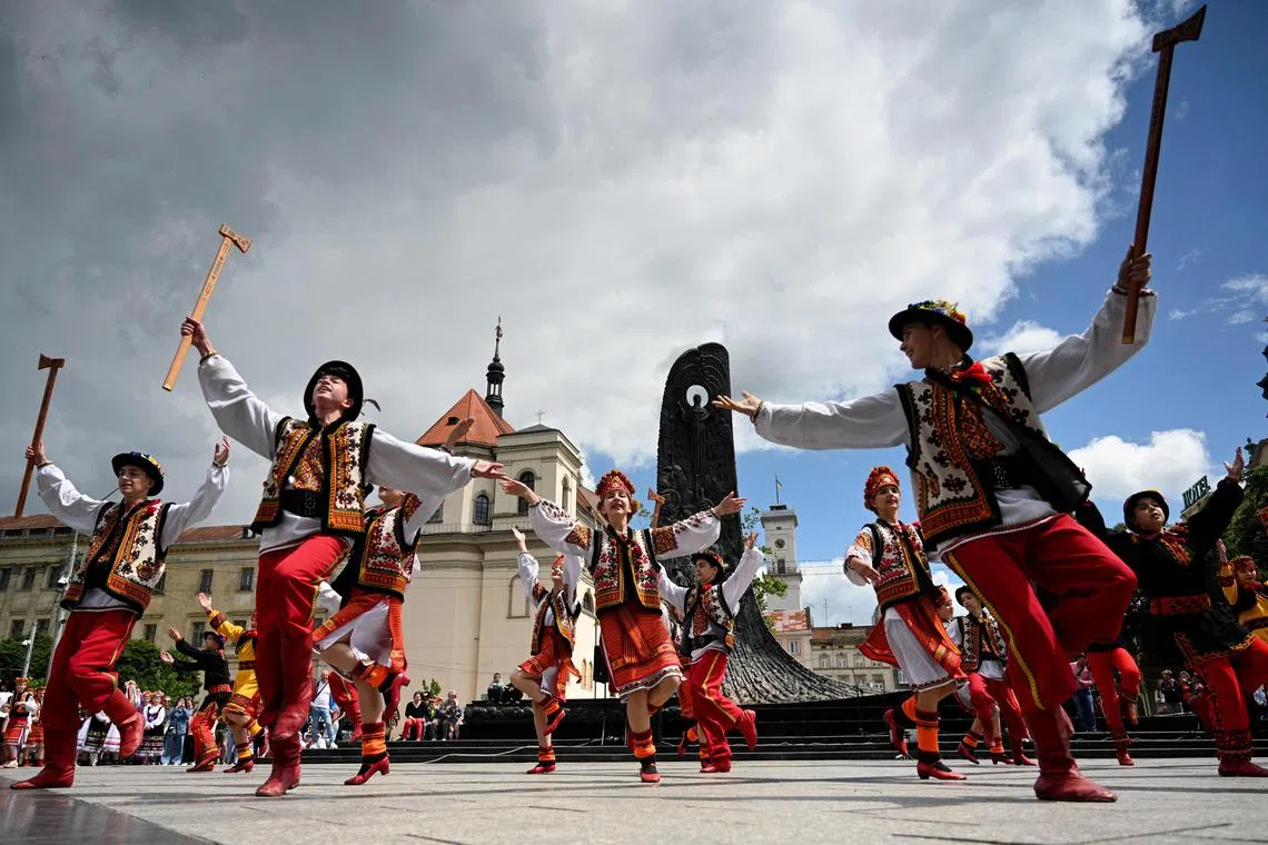 Traditional Ukrainian dances are performed on Ukrainian Constitution Day in Lviv, in June 2023.