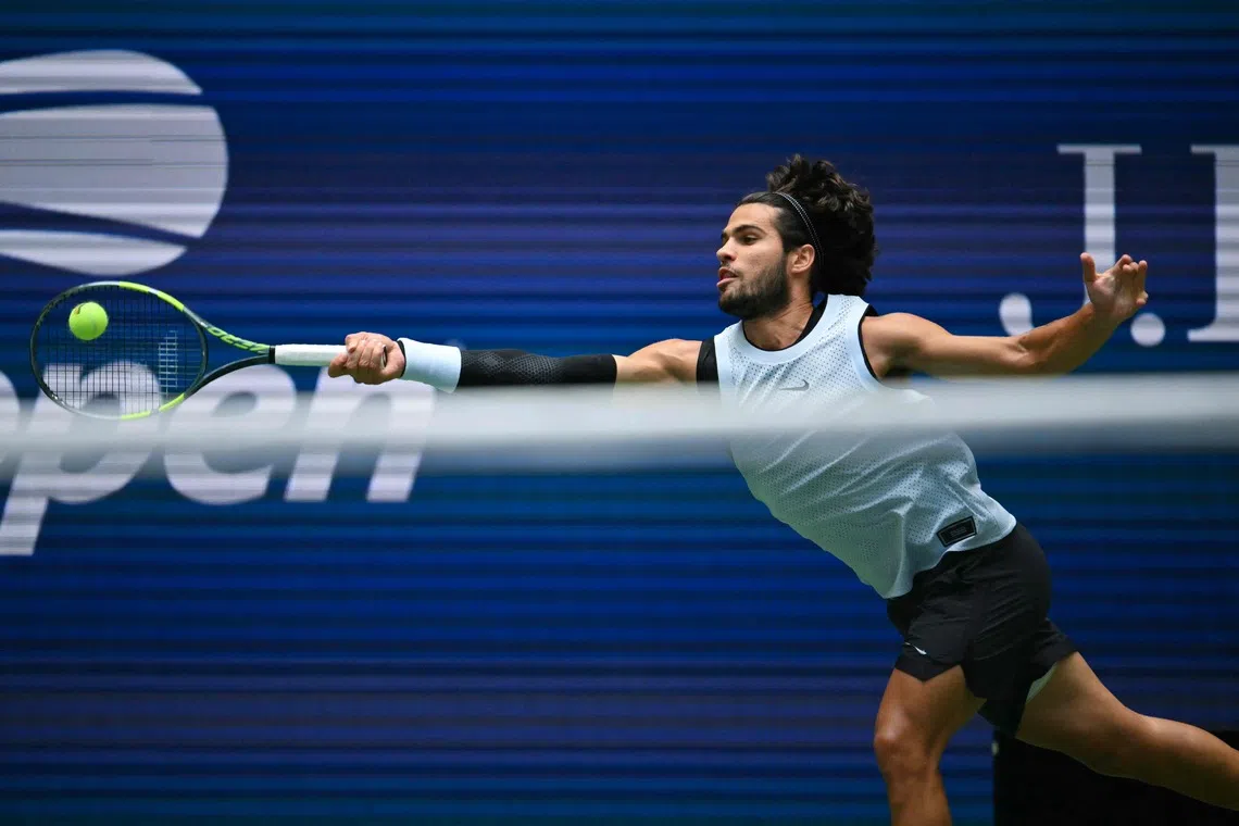 Spain’s Carlos Alcaraz hits a return to USA’s Tommy Paul during their men’s singles match at the US Open tennis tournament on Sept 6.