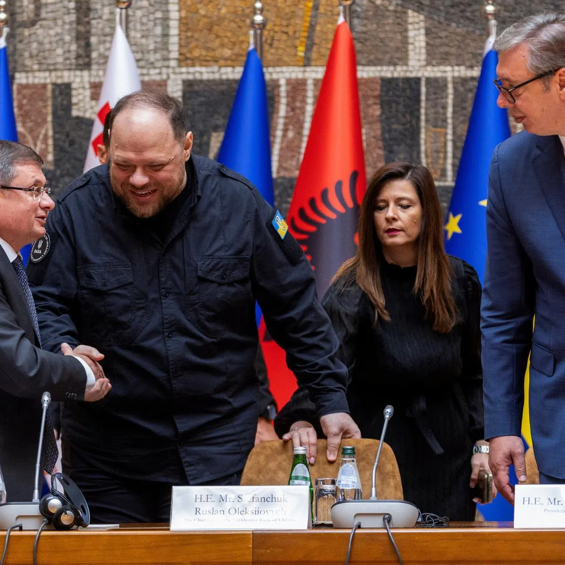 Serbian President Aleksandar Vucic, President of the Parliament of Moldova Igor Grosu and Chairman of the Verkhovna Rada of Ukraine Ruslan Stefanchuk speak at the inaugural meeting of the Speakers of Parliament of EU candidate countries, in Belgrade, Serbia, July 7, 2026. REUTERS/Djordje Kojadinovic