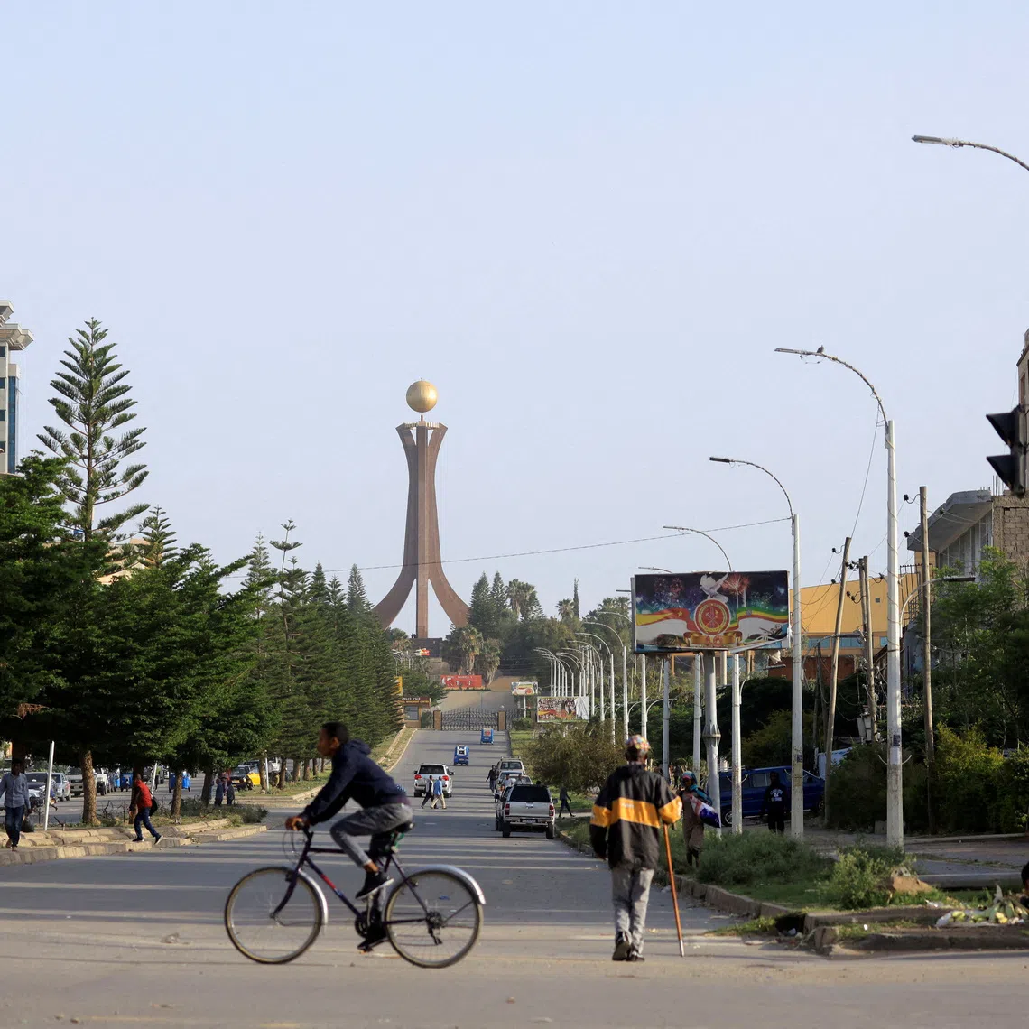 FILE PHOTO: A general view shows motorists, a biker and pedestrians near the Tigray Martyrs monument in Mekele, Tigray Region, Ethiopia, June 22, 2023. REUTERS/Tiksa Negeri/File Photo