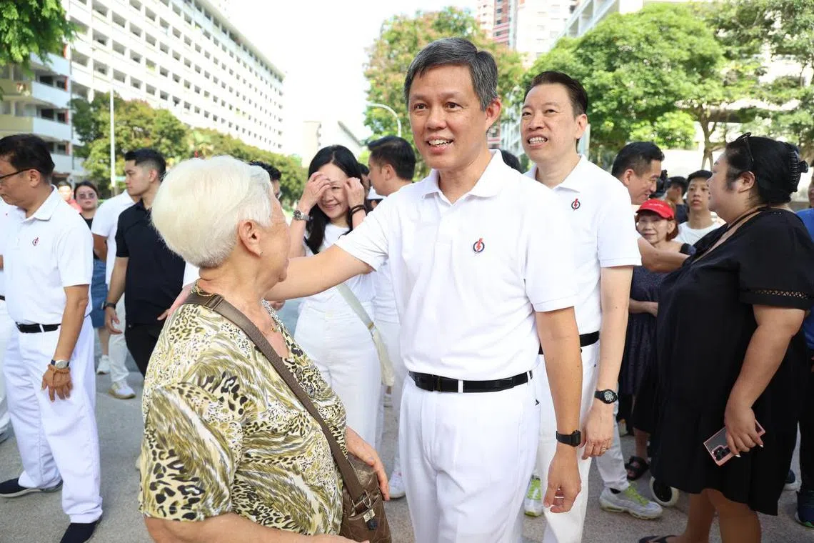 Education Minister Chan Chun Sing during a walkabout at Blk 85 Redhill Lane on April 27.