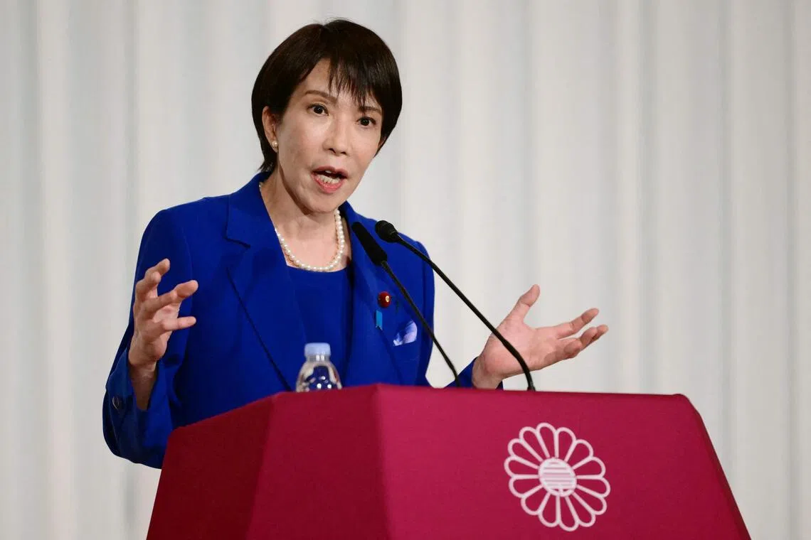 Sanae Takaichi, the newly-elected leader of Japan's ruling party, the Liberal Democratic Party (LDP), attends a press conference after the LDP presidential election in Tokyo on October 4, 2025. Conservative Sanae Takaichi hailed a "new era" on October 4 after winning the leadership of Japan's ruling party, putting her on course to become the country's first woman prime minister. (Photo by Yuichi YAMAZAKI / POOL / AFP)
