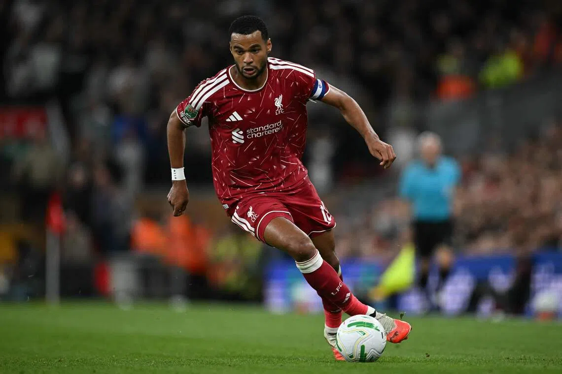 Liverpool’s Dutch striker Cody Gakpo runs with the ball during the match.