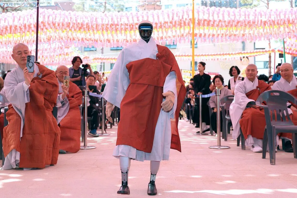 Gabi, a humanoid robot dressed as a Buddhist monk, attends an ordination ceremony as part of celebrations for the upcoming Buddha's birthday at Jogye Temple in Seoul on May 6, 2026.
