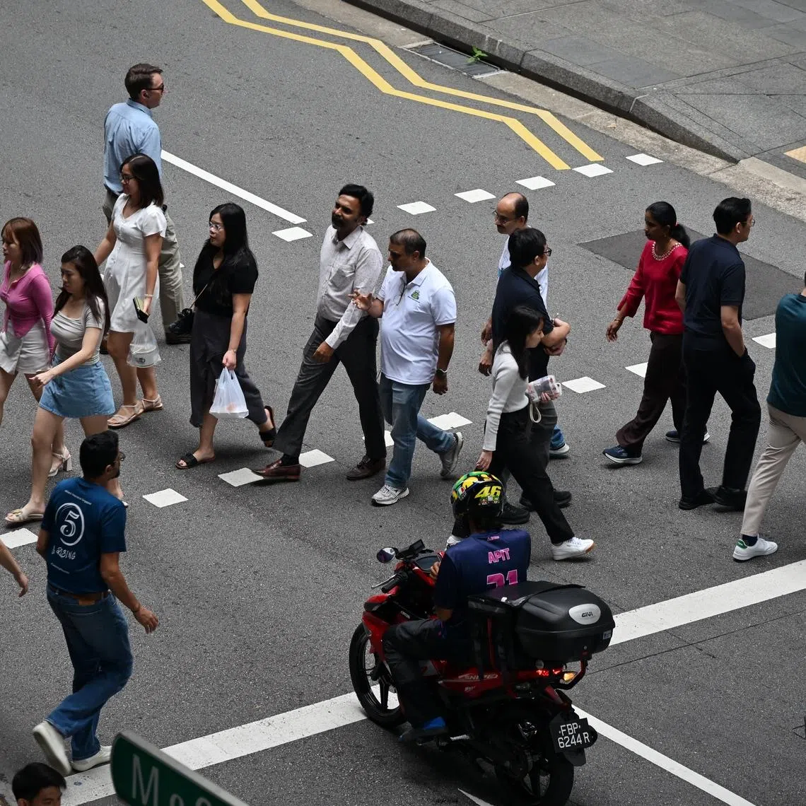 Singapore's embrace of artificial intelligence is good for the economy but it may put pressure on the jobs and incomes of some professionals.
