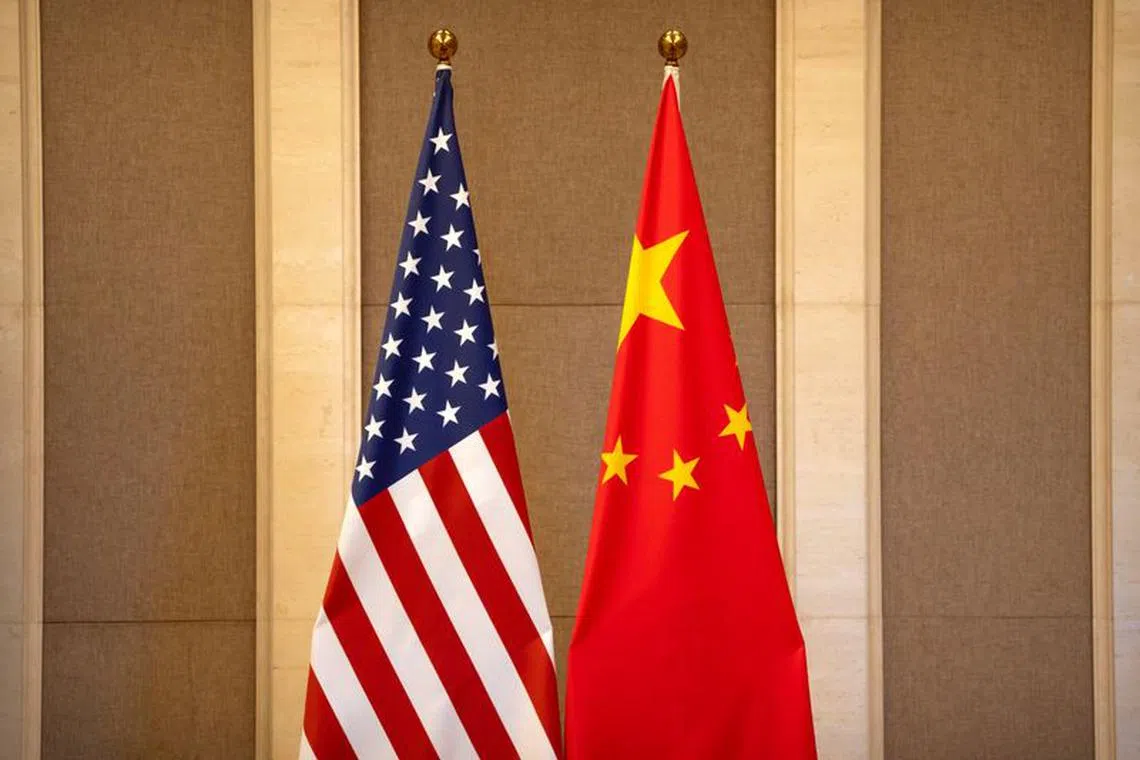 FILE PHOTO: United States and Chinese flags are set up before a meeting between U.S. Treasury Secretary Janet Yellen and Chinese Vice Premier He Lifeng at the Diaoyutai State Guesthouse in Beijing, China, Saturday, July 8, 2023.  Mark Schiefelbein/Pool via REUTERS/File Photo