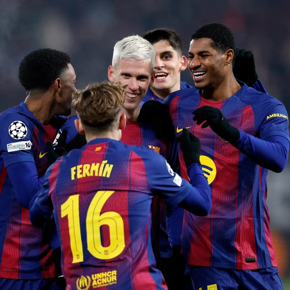 Soccer Football - UEFA Champions League - Slavia Prague v FC Barcelona - Fortuna Arena, Prague, Czech Republic - January 21, 2026 FC Barcelona's Dani Olmo celebrates scoring their third goal with teammates REUTERS/David W Cerny