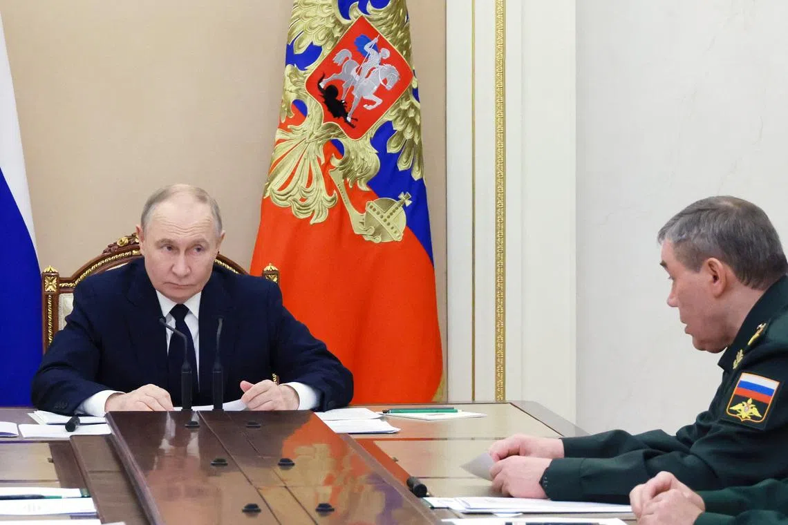 Russian President Vladimir Putin and Chief of the General Staff of the Russian Armed Forces Valery Gerasimov attend a meeting on the \"special military operation\" amid the ongoing Russia-Ukraine conflict in Moscow, Russia, December 29, 2025. Sputnik/Mikhail Metzel/Pool via REUTERS