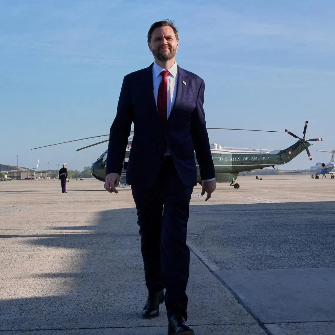 FILE PHOTO: U.S. Vice President JD Vance walks to speak to the media before boarding Air Force Two for expected departure to Pakistan for talks on Iran, at Joint Base Andrews, Maryland, U.S., April 10, 2026. Jacquelyn Martin/Pool via REUTERS/File Photo