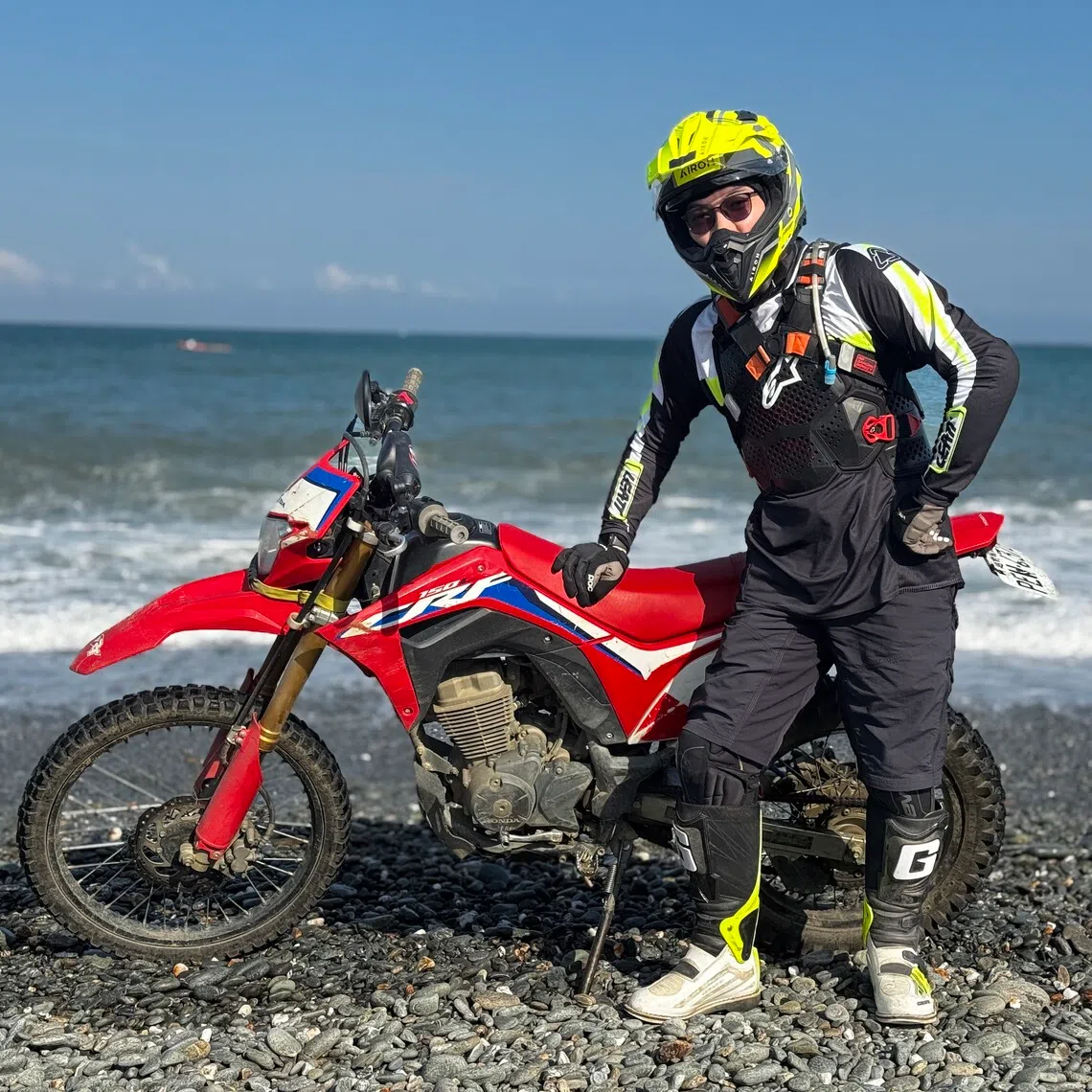 The writer riding at Dongao Bay, Taiwan.