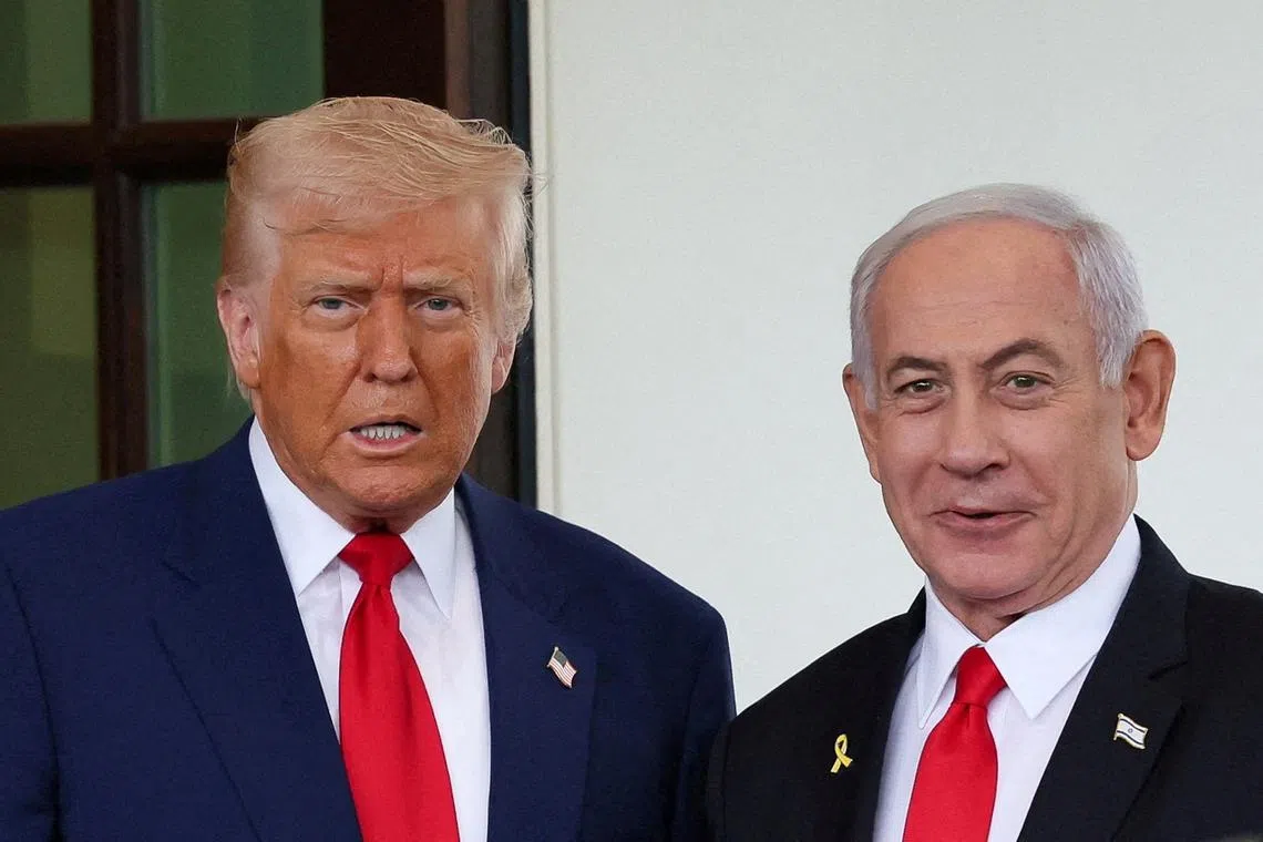 FILE PHOTO: U.S. President Donald Trump welcomes Israeli Prime Minister Benjamin Netanyahu at the entrance of the White House in Washington, D.C., U.S., April 7, 2025. REUTERS/Leah Millis/File Photo