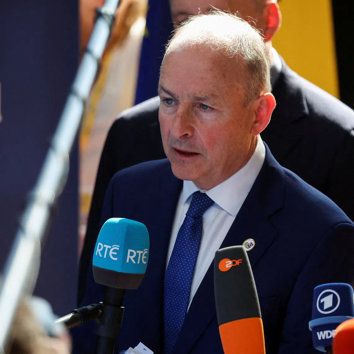 FILE PHOTO: Irish Taoiseach Micheal Martin speaks to the press on the day of a European Union leaders summit in Brussels, Belgium, June 19, 2026. REUTERS/Laia Ros/File Photo