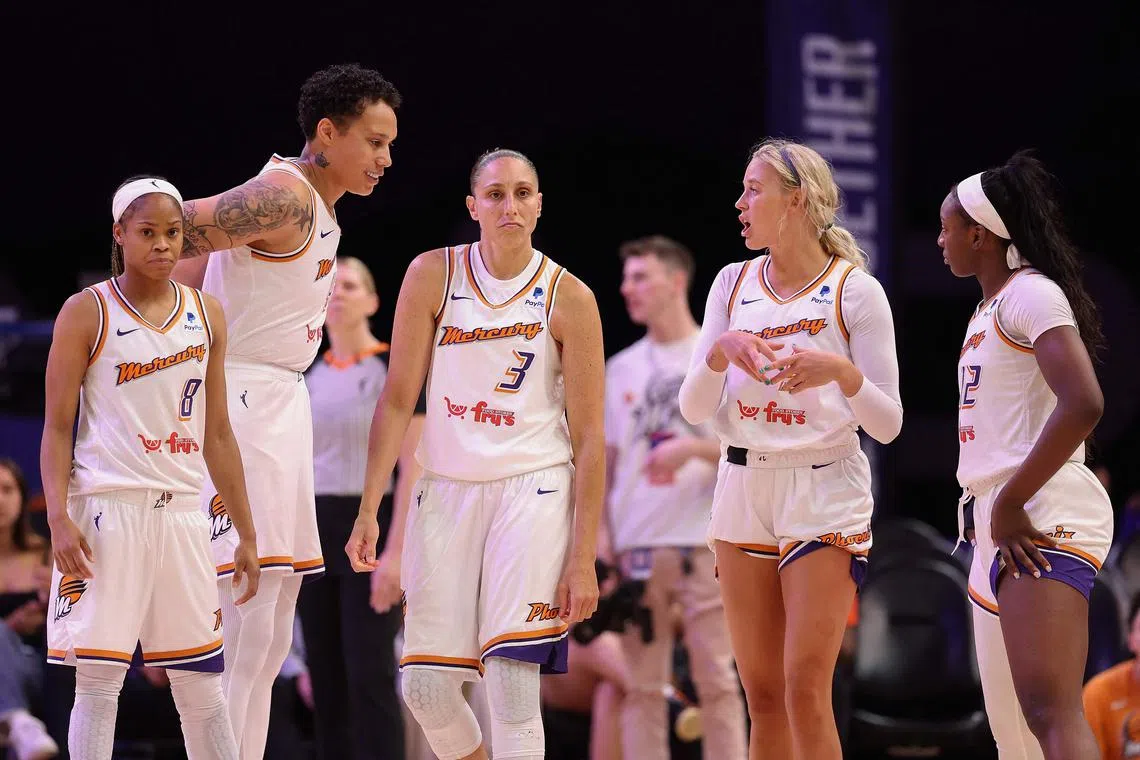 Brittney Griner (second from left) and her Phoenix Mercury teammates have started their WNBA season with a 1-5 record.