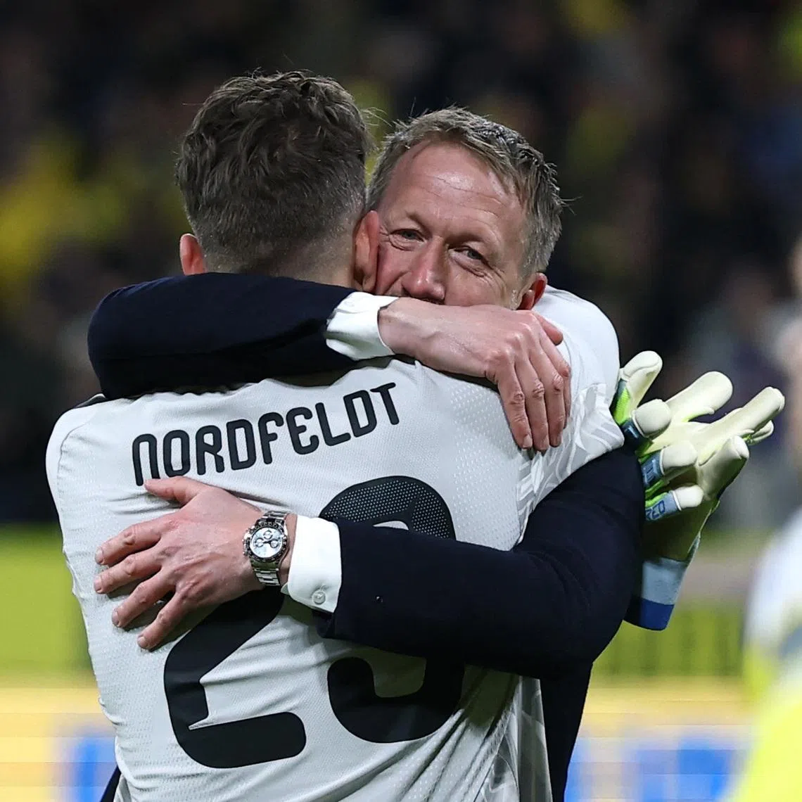 Soccer Football - FIFA World Cup - UEFA Qualifiers - Finals - Sweden v Poland - Strawberry Arena, Solna, Sweden - March 31, 2026 Sweden's Kristoffer Nordfeldt and coach Graham Potter celebrate qualifying for the FIFA World Cup REUTERS/Kacper Pempel
