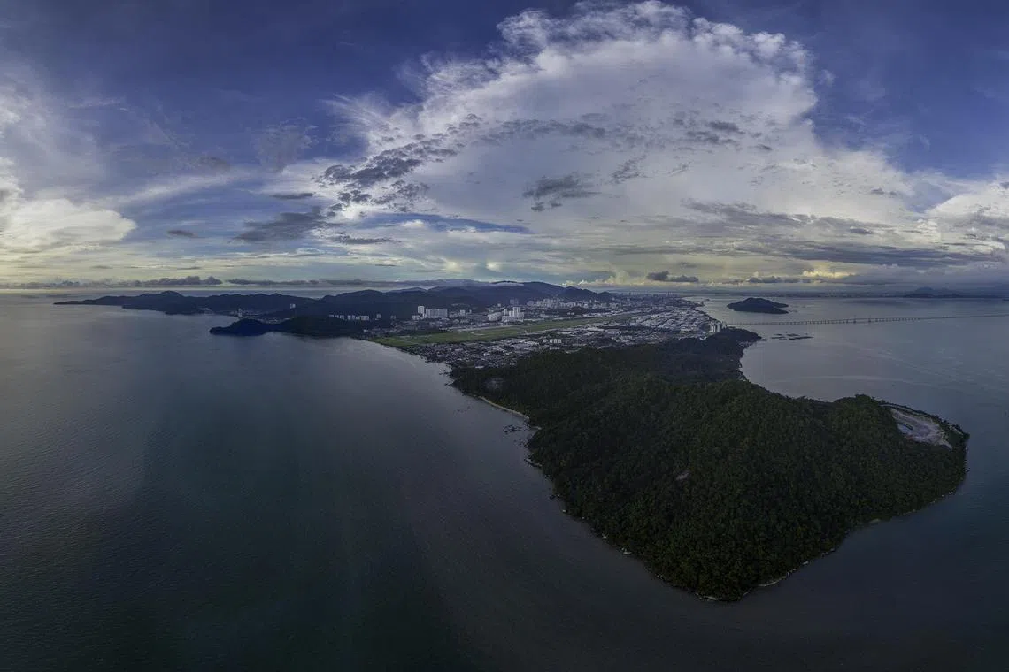 stpsi/stpolls - Aerial view of the proposed reclamation area which Penang's state government believes is a strategic location just south of the airport and its industrial free zone. Photo: David ST Loh