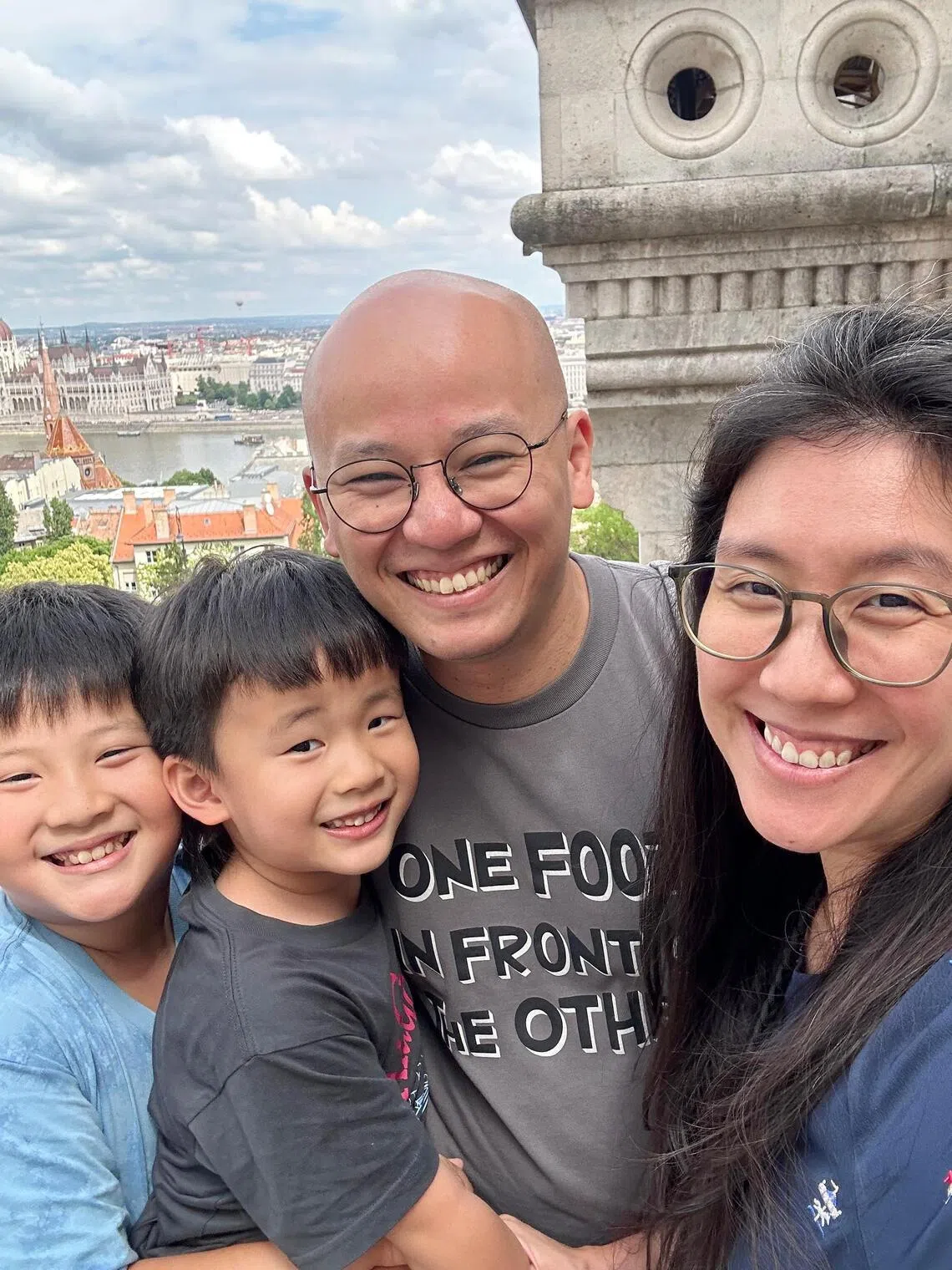 See Haojun (second from right) and his wife Clara Khoo, with their sons (from left) Nathanael and Elijah.