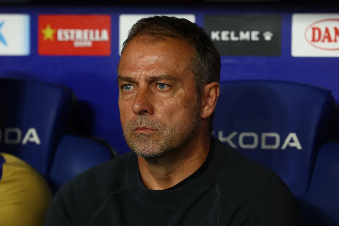 FILE PHOTO: Soccer Football - LaLiga - Espanyol v FC Barcelona - RCDE Stadium, Cornella de Llobregat, Spain - May 15, 2025 FC Barcelona coach Hansi Flick looks on REUTERS/Albert Gea/File Photo