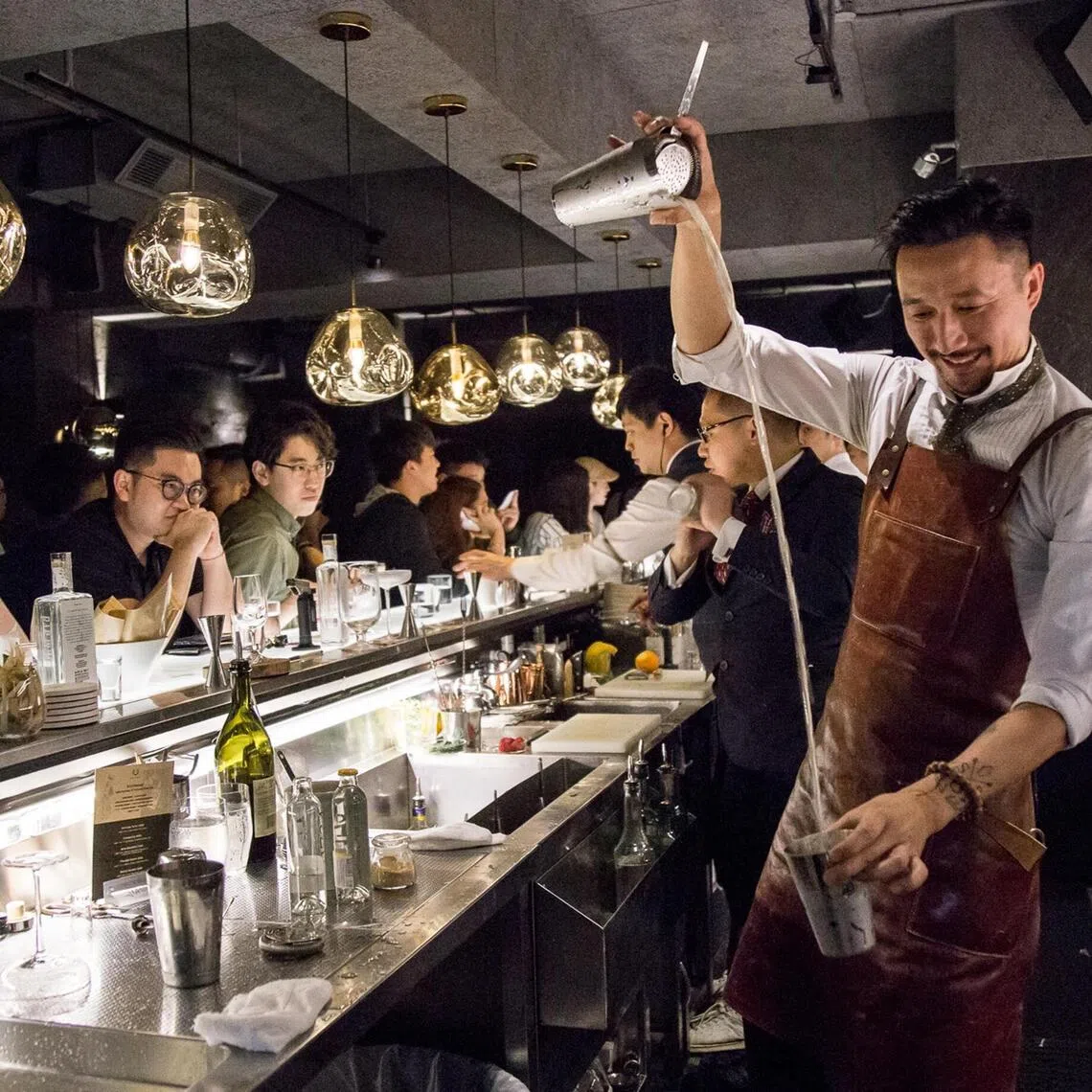 Mr Kit Cheung (right) co-founded Perfume Trees Gin, an internationally acclaimed spirit made with 13 botanicals.