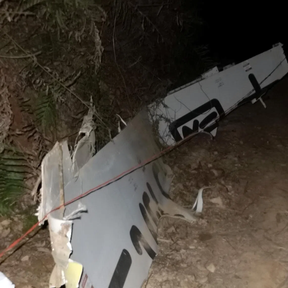 Plane debris is seen at the site where a China Eastern Airlines Boeing 737-800 plane flying from Kunming to Guangzhou crashed, in Wuzhou, Guangxi Zhuang Autonomous Region, China March 21, 2022. Picture taken March 21, 2022. cnsphoto via REUTERS