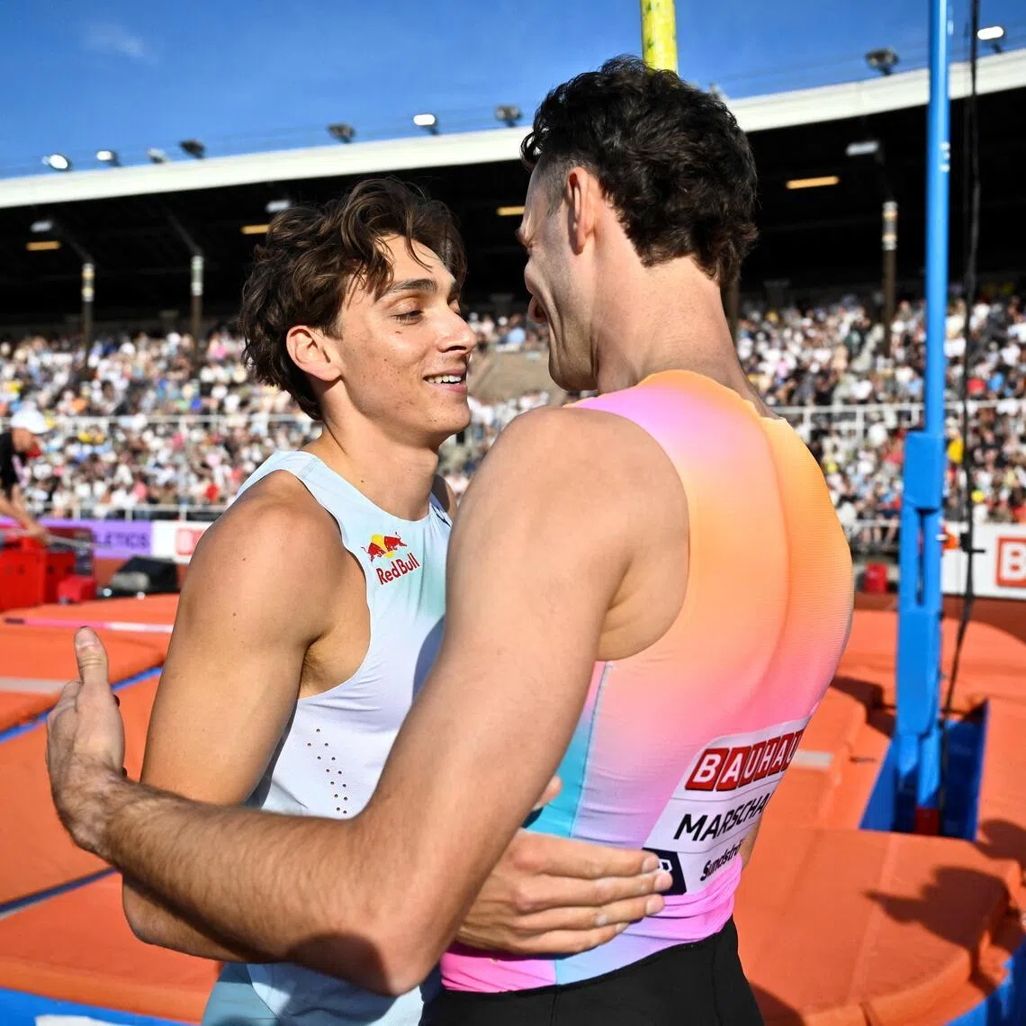 Sweden's Armand Duplantis (left) with winner Kurtis Marschall of Australia after the men's pole vault final at the Diamond League meet at Stockholm Olympic Stadium in Sweden on June 7, 2026.