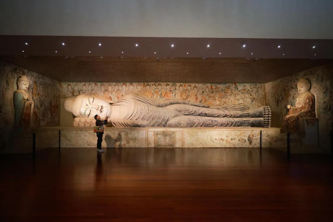 A 13m-long reclining Buddha at the ACM’s foyer.