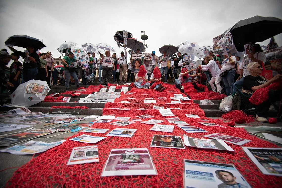 Relatives of missing persons and members of search collectives protest during the opening of the FIFA World Cup 2026 in Mexico on June 11.