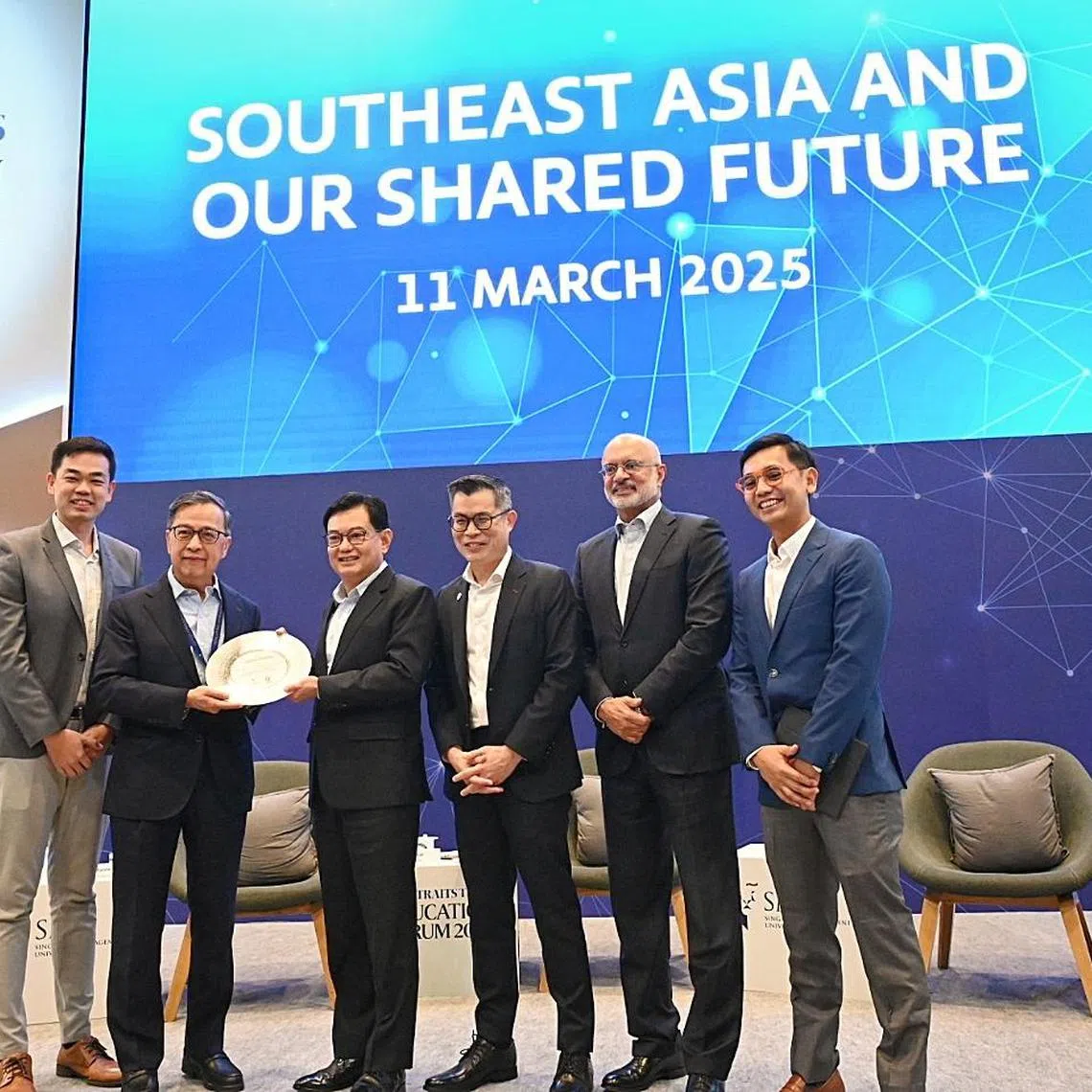 The Straits Times Education Forum 2025 on March 11, 2025 at SMU . From left : 
From left : Mr Aaron Tan - Co -founder, Carro and SMU Alumnus ; Prof Alan Chan - SMU Provost-Designate, Singapore Management University ; DPM Heng Swee Keat ; Jamie Ho , Editor , The Straits Times and Mr Aldi Haryopratomo - Investor and Entrepreneur.