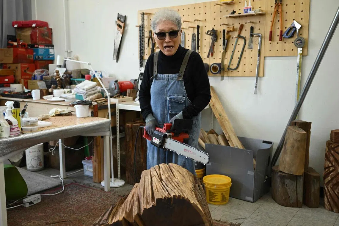 South Korea's chainsaw artist Kim Yun Shin carves a name for herself at 91