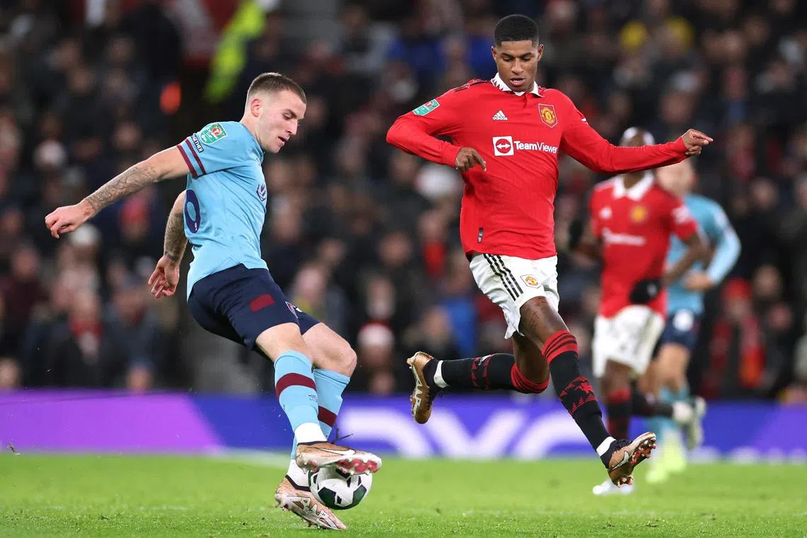 Burnley's Jordan Beyer (left) in action with Manchester United's Marcus Rashford.