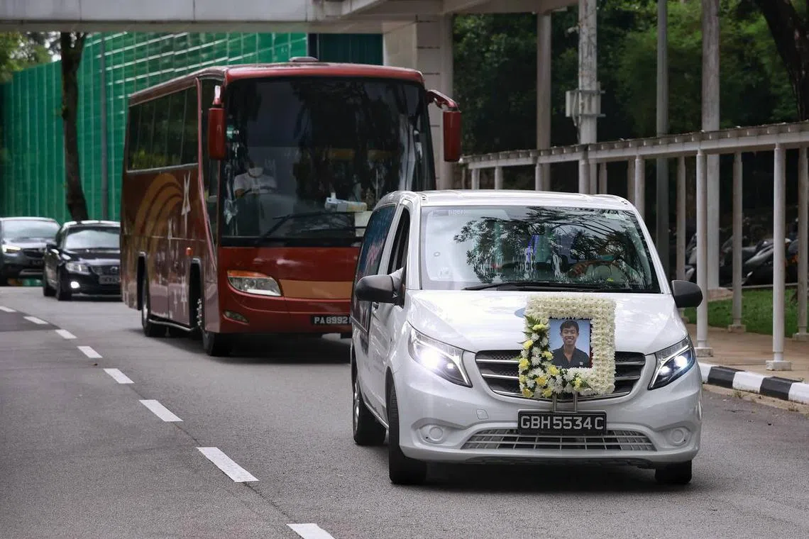 The hearse carrying the casket of Sergeant (1) Edward H Go striving for the ceremonial procession at Mandai Crematorium and Columbarium on Dec 13, 2022.