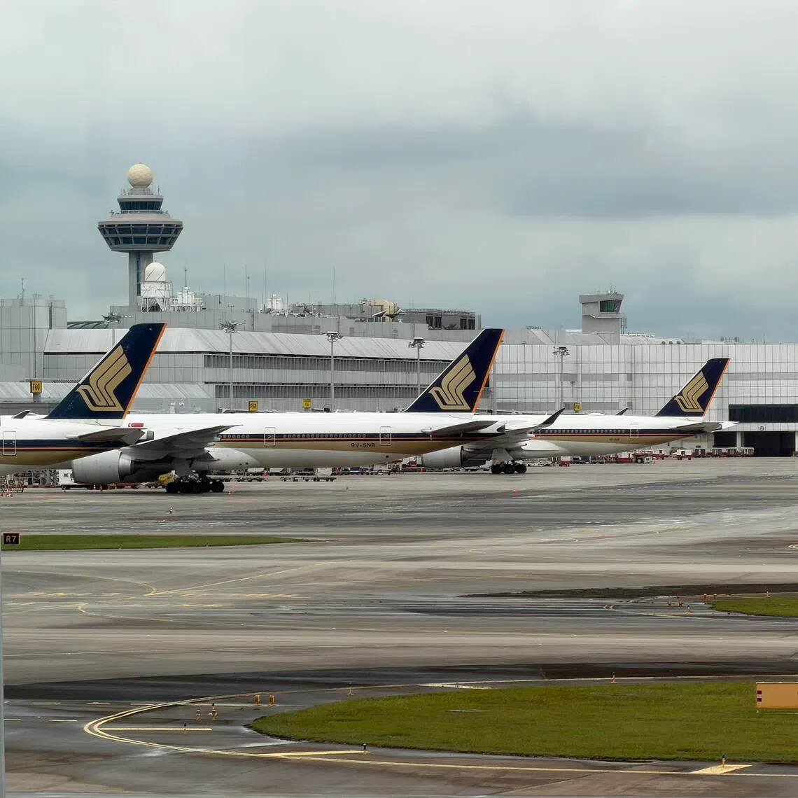 Generic photo of a Singapore Airlines (SIA) aircraft on the tarmac at Changi Airport, with the construction of Terminal 5 in the background, on 17 December 2025.