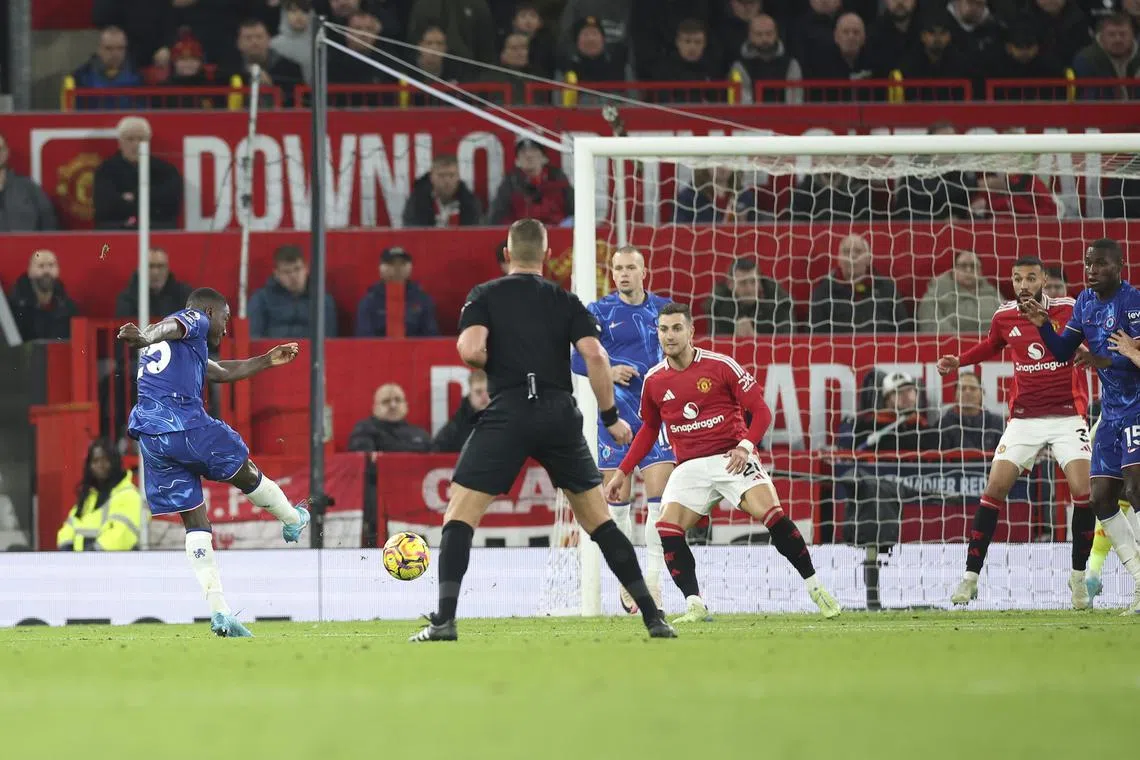 Moises Caicedo of Chelsea (left) scores the 1-1 goal during the English Premier League soccer match between Manchester United and Chelsea FC.