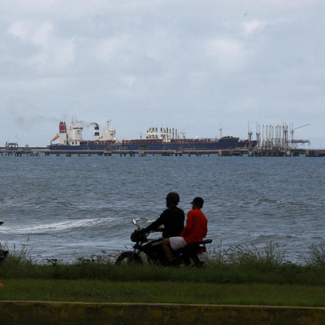 The Guinea-flagged oil tanker MT Bandra, which is under sanctions, is partially seen alongside another vessel at El Palito terminal, near Puerto Cabello, Venezuela on Dec 29, 2025. 