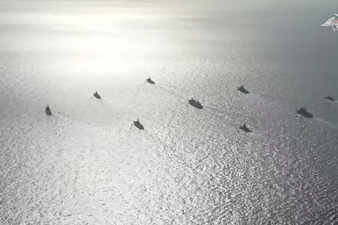 A still image from a video, released by Russia's Defence Ministry, shows what it said to be Russian and Chinese navy ships jointly patrolling the Pacific Ocean and holding naval exercises in the East China Sea, in this image taken from footage released August 18, 2023. Russian Defence Ministry/Handout via REUTERS