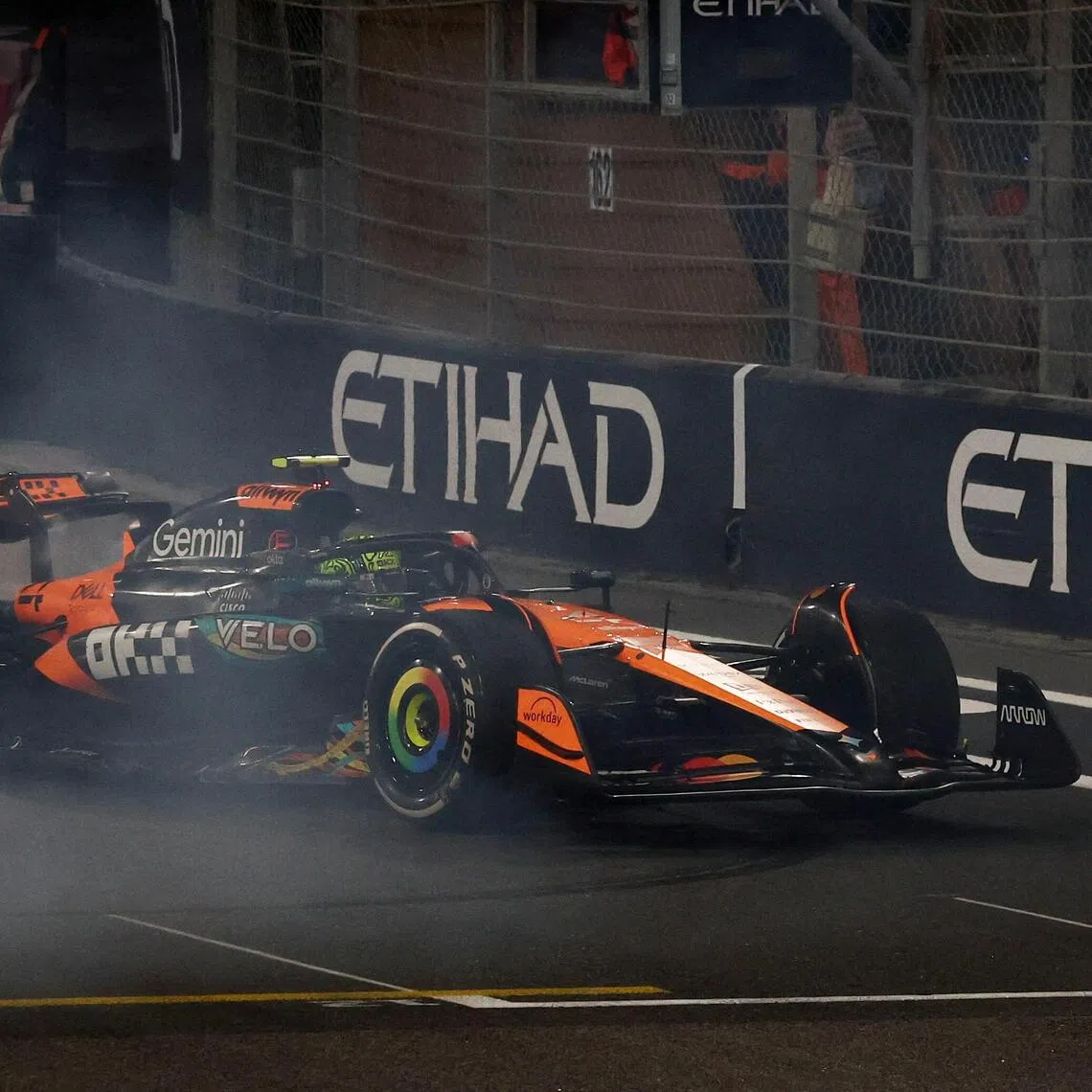 McLaren's Lando Norris celebrates after becoming the 2025 Formula One world champion.