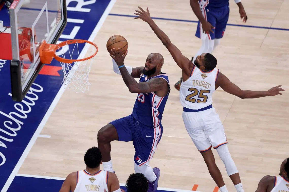 In the first game of his record 24th NBA season, LeBron James registered 14 points, nine rebounds and seven assists.