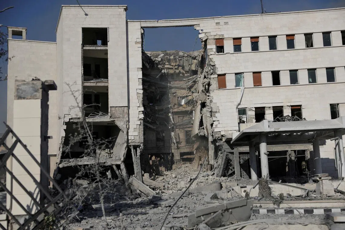 FILE PHOTO: A view of a destroyed building, after powerful airstrikes shook Damascus on Wednesday, targeting the defense ministry, as Israel vowed to destroy Syrian government forces attacking Druze communities in southern Syria and demanded their withdrawal, in Damascus July 16, 2025. REUTERS/Khalil Ashawi/File Photo