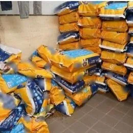 Singapore Customs officers found duty-unpaid cigarettes hidden in and among packages labelled as "dog food" in a public utilities room in Choa Chu Kang.