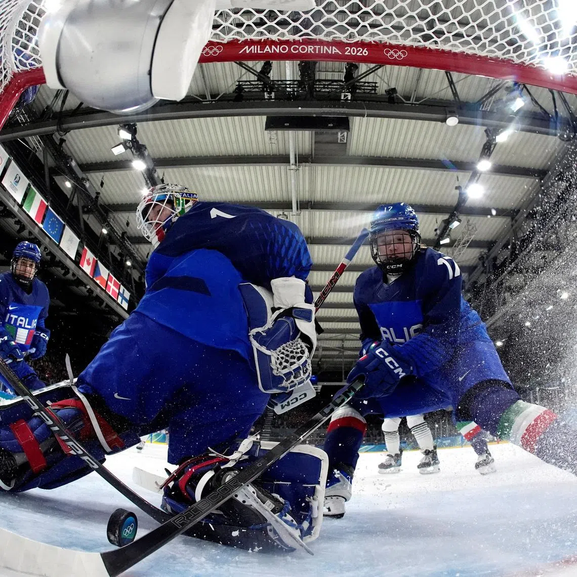 Milano Cortina 2026 Olympics - Ice Hockey - Women's Preliminary Round - Group B - Japan vs Italy - Milano Rho Ice Hockey Arena, Milan, Italy - February 09, 2026. Akane Shiga of Japan scores their second goal past Gabriella Durante of Italy and Matilde Fantin of Italy Pool via REUTERS/Hassan Ammar