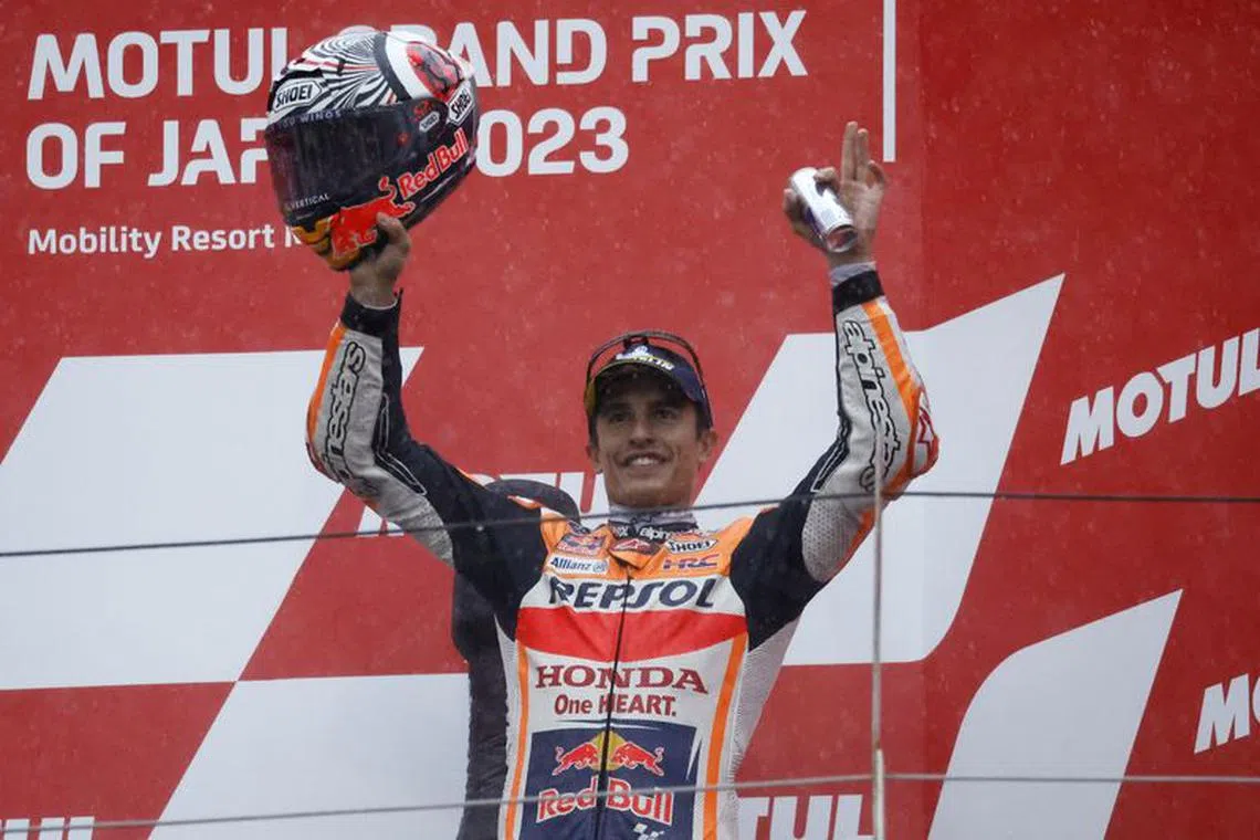 FILE PHOTO-MotoGP - Japanese Grand Prix - Mobility Resort Motegi, Motegi, Japan - October 1, 2023 Repsol Honda Team's Marc Marquez celebrates on the podium after finishing third in the MotoGP REUTERS/Issei Kato/File Photo