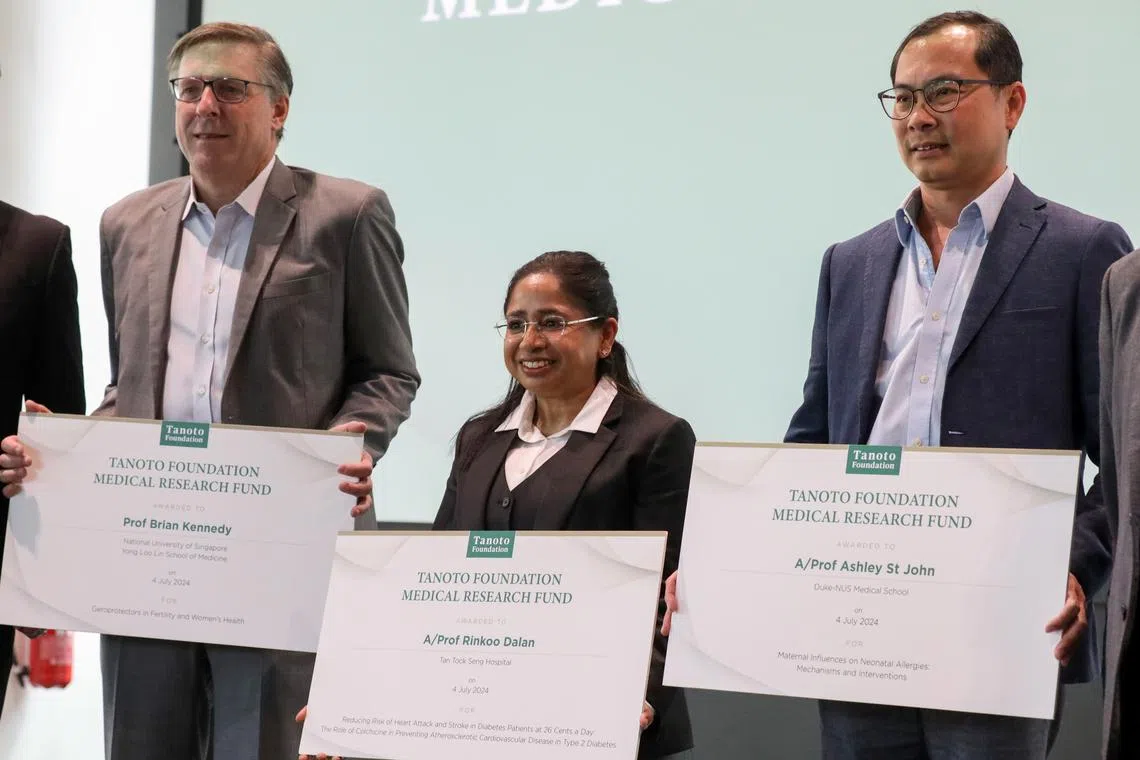 (From left) Professor Brian Kennedy from NUS, Associate Professor Rinkoo Dalan from Tan Tock Seng Hospital and Professor Jerry Chan, representing Associate Professor Ashley St John from the Duke-NUS Medical School.