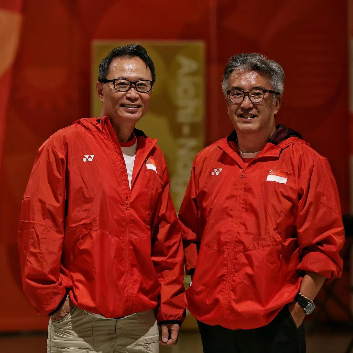 Vicente Tai (left) and Yuichiro Kubo are volunteers with the Singapore National Olympic Council (SNOC) at the Aichi-Nagoya 2026 Asian Games.
